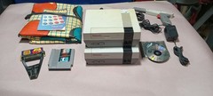 NES Action Bundle Set: 2 Consoles, 2 Controllers, Zapper, Powerpad + Game Genie