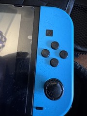 Nintendo Switch Hybrid Console w/ Dock. Includes 5 games.