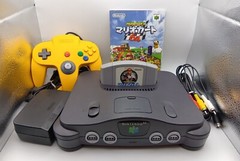 Nintendo 64 console, yellow controller, power cable, adapter, Mario Kart tested