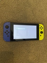 Nintendo Switch 32GB Handheld Console – Neon Yellow/Dark Blue – Games Separate