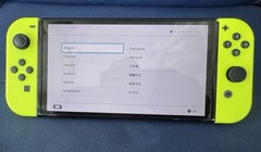 Nintendo Switch – OLED Model with original Green Joy-Cons-excellent .