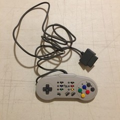 Vintage SNES Super Nintendo Blockbuster Video game console controller 1990s