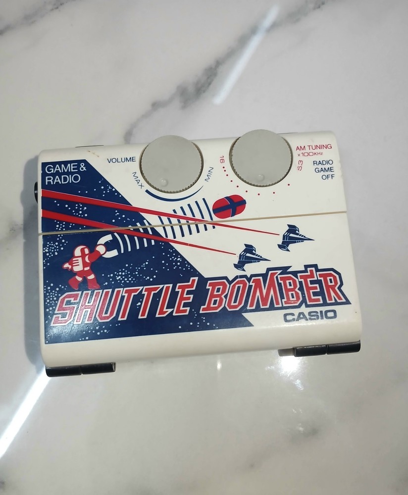 Vintage Casio Shuttle Bomber CG-70 Game & Radio Handheld System 1983