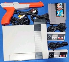 Nintendo Entertainment System NES W/ OEM Controllers Zapper Adapter & Mario Duck