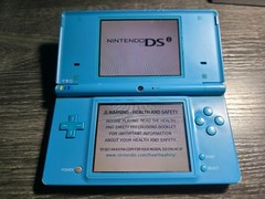 Nintendo DSi Light Blue Handheld Console System Only TESTED (SCREEN SCRATCHES)